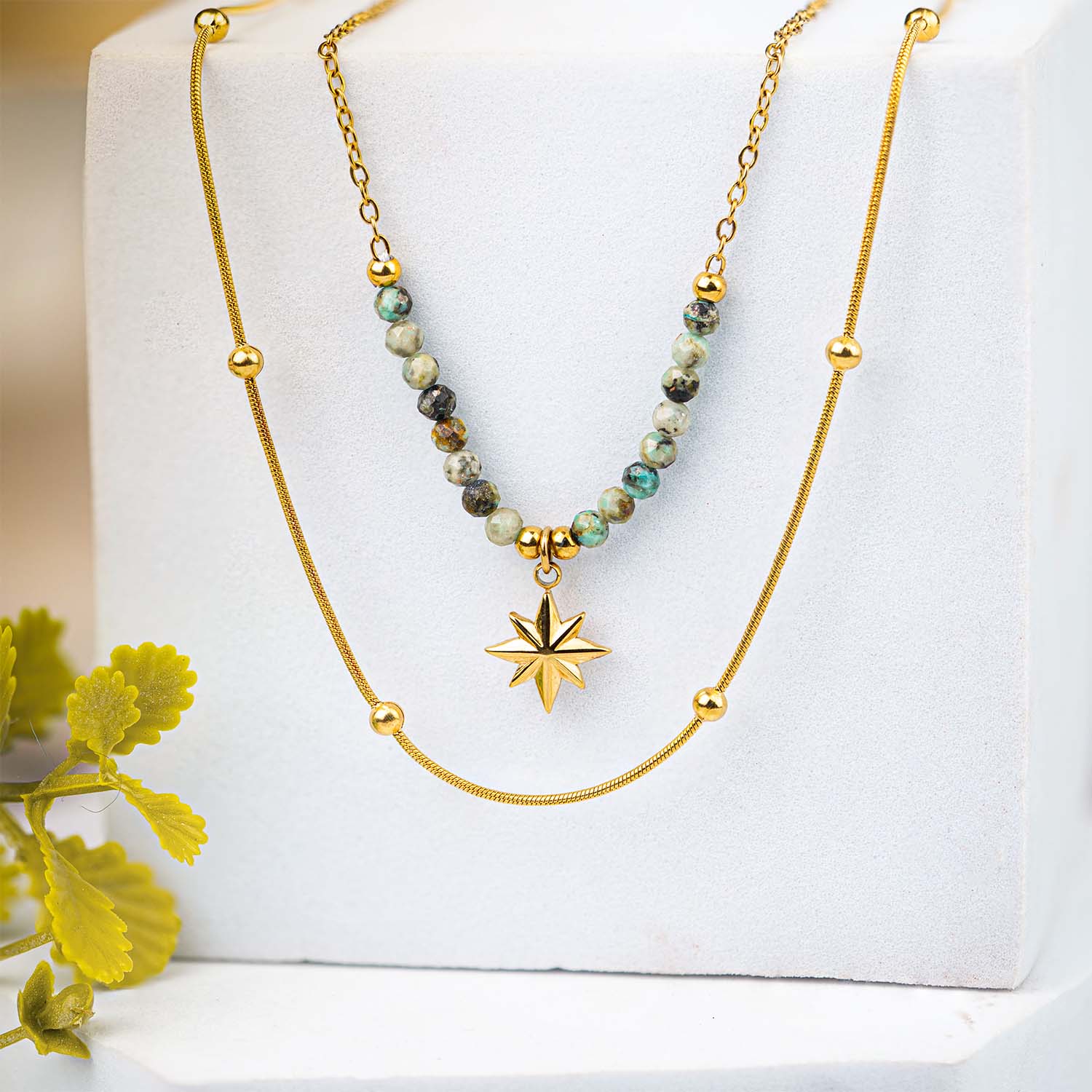 Astra Multi-Layer Gold Star Necklace with Emerald Stone